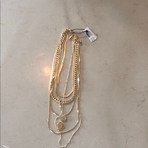 White house black market convertible gold necklace